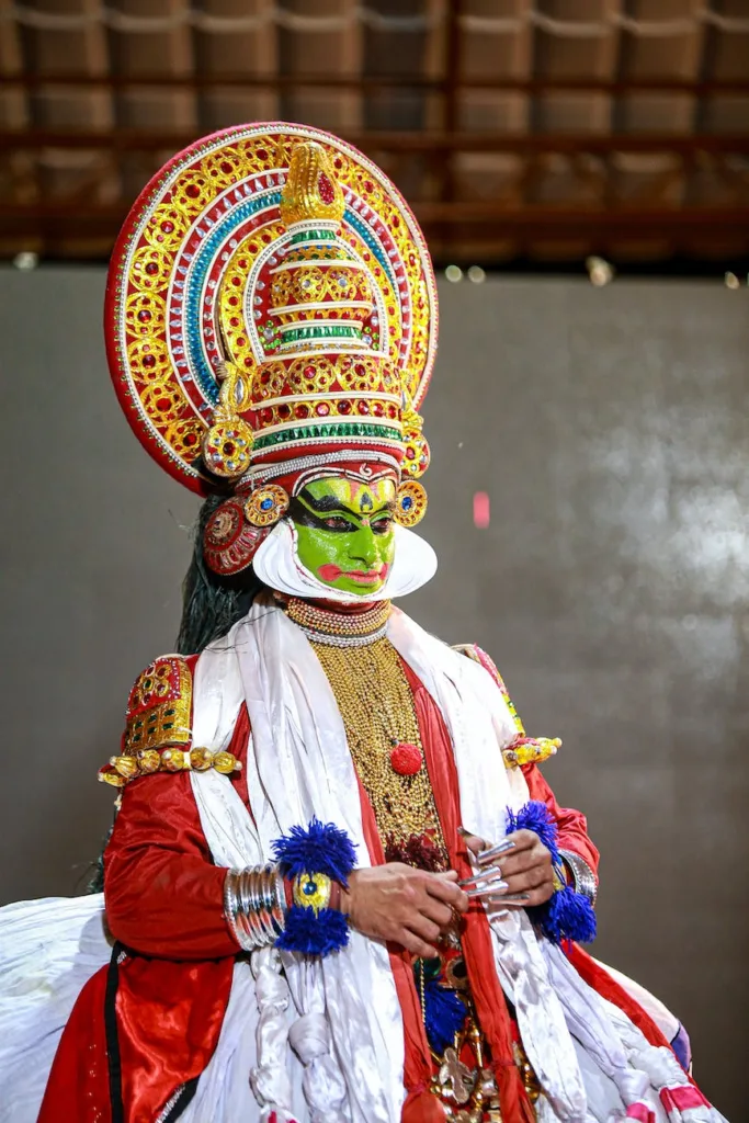 a person in traditional wear Kerala traditional home building Premier home builders in Pathanamthitta
